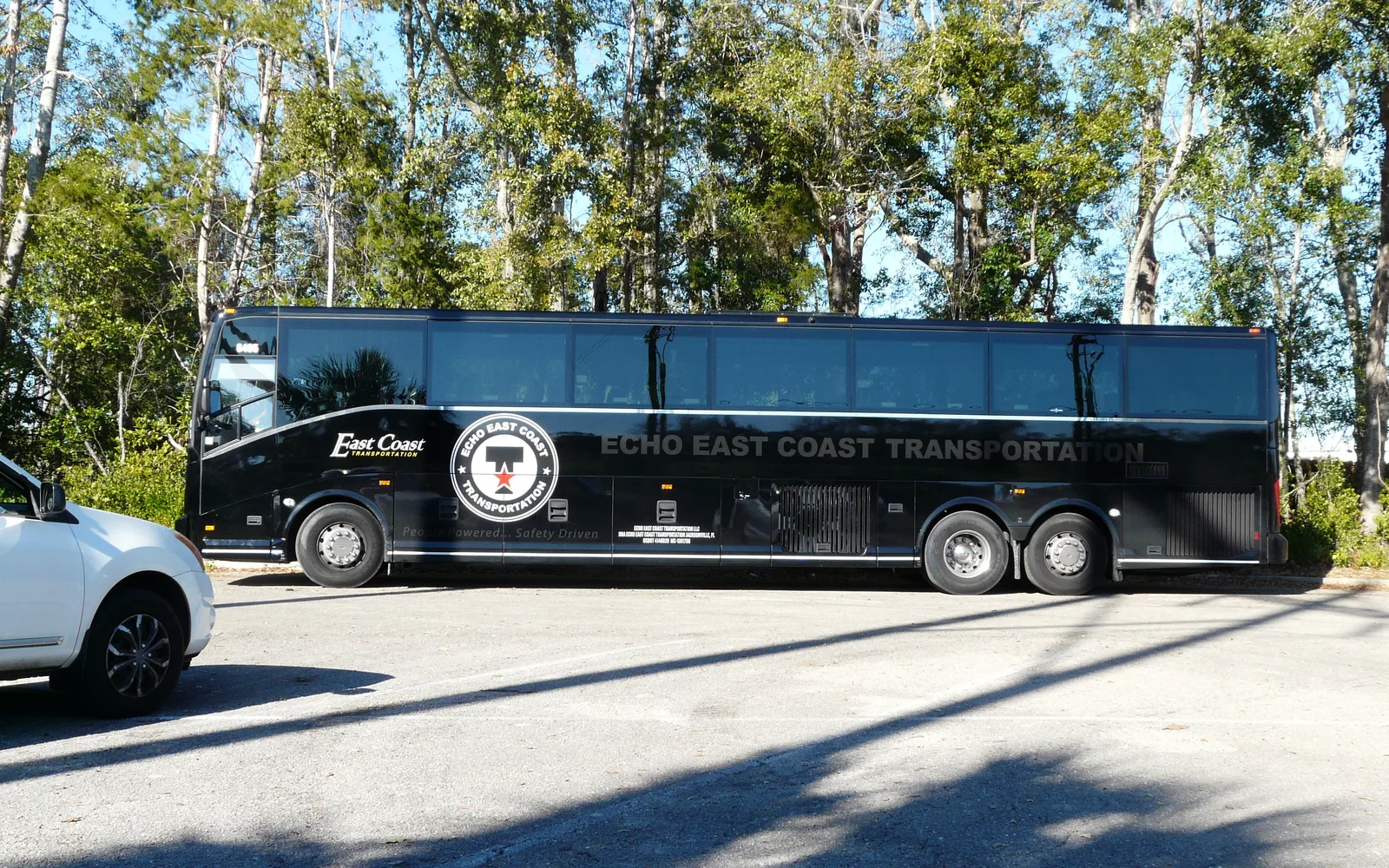 Echo East Coast Transportation bus, side view