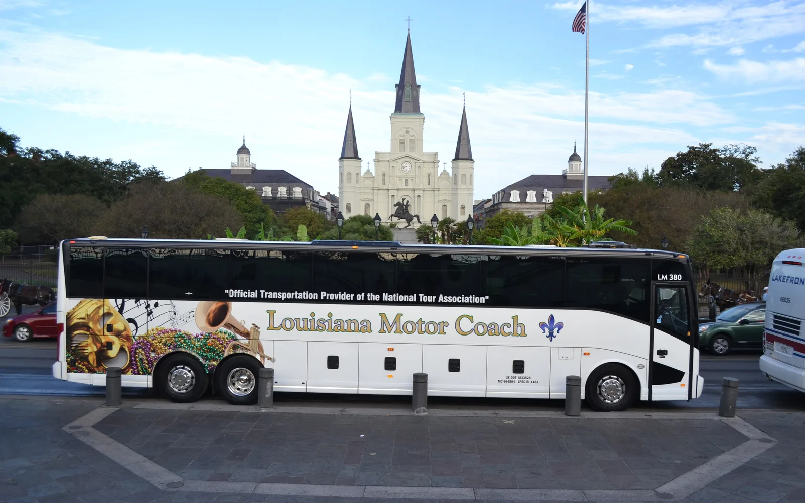 Motor Coach West And Motor Coach East bus, side view