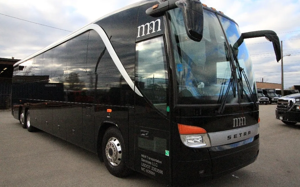 M&m Limousine Service Inc. bus, front corner view