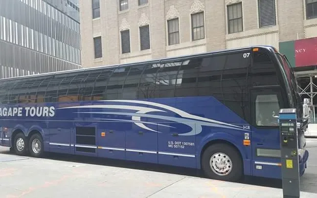 Agape Travel And Tours bus, side view