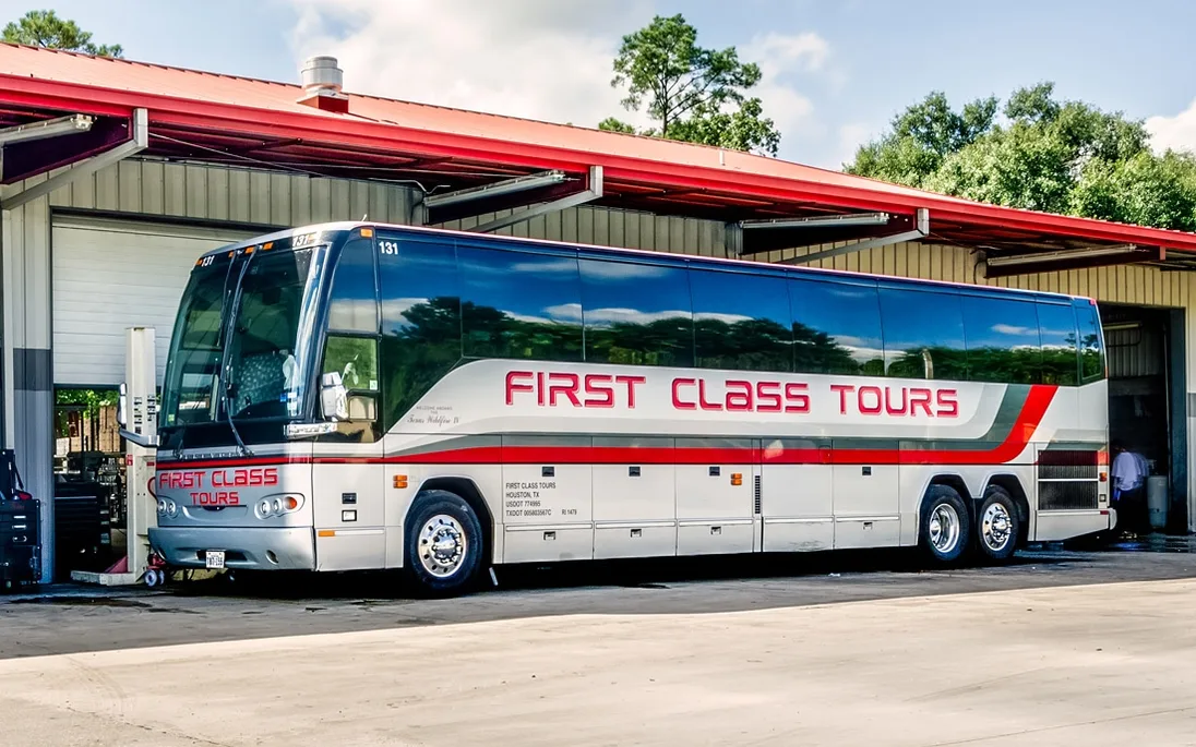 First Class Transportation, LLC bus, front corner view