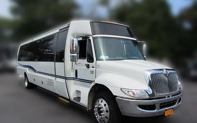 M & V Limousine bus, front corner view