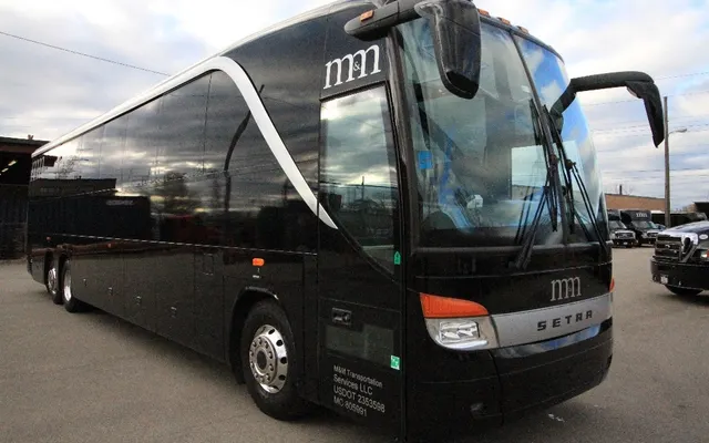 M&m Limousine Service Inc. bus, front corner view