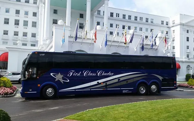 First Class Charter, LLC bus, side view