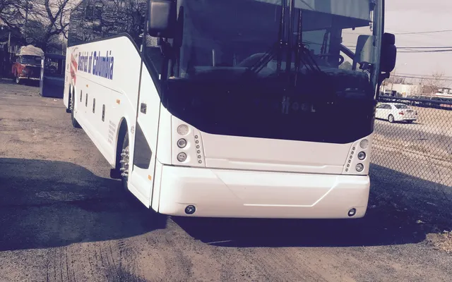 George Towne Trolley Tours And Transportion LLC bus, front corner view